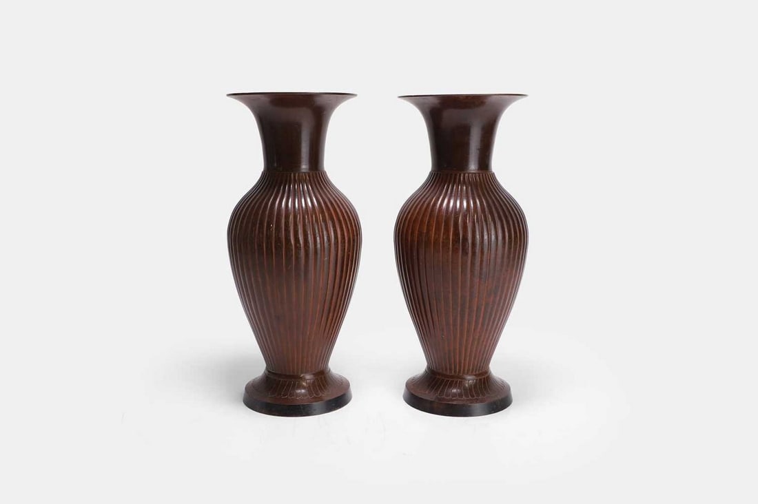 A pair of patinated metal urns, of recent manufacture, (1 of 4)