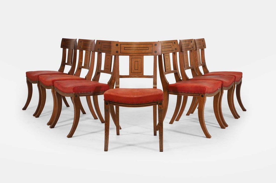 A set of seven oak and leather ‘Grecian’ dining chairs by Howe, of recent manufacture, (1 of 4)