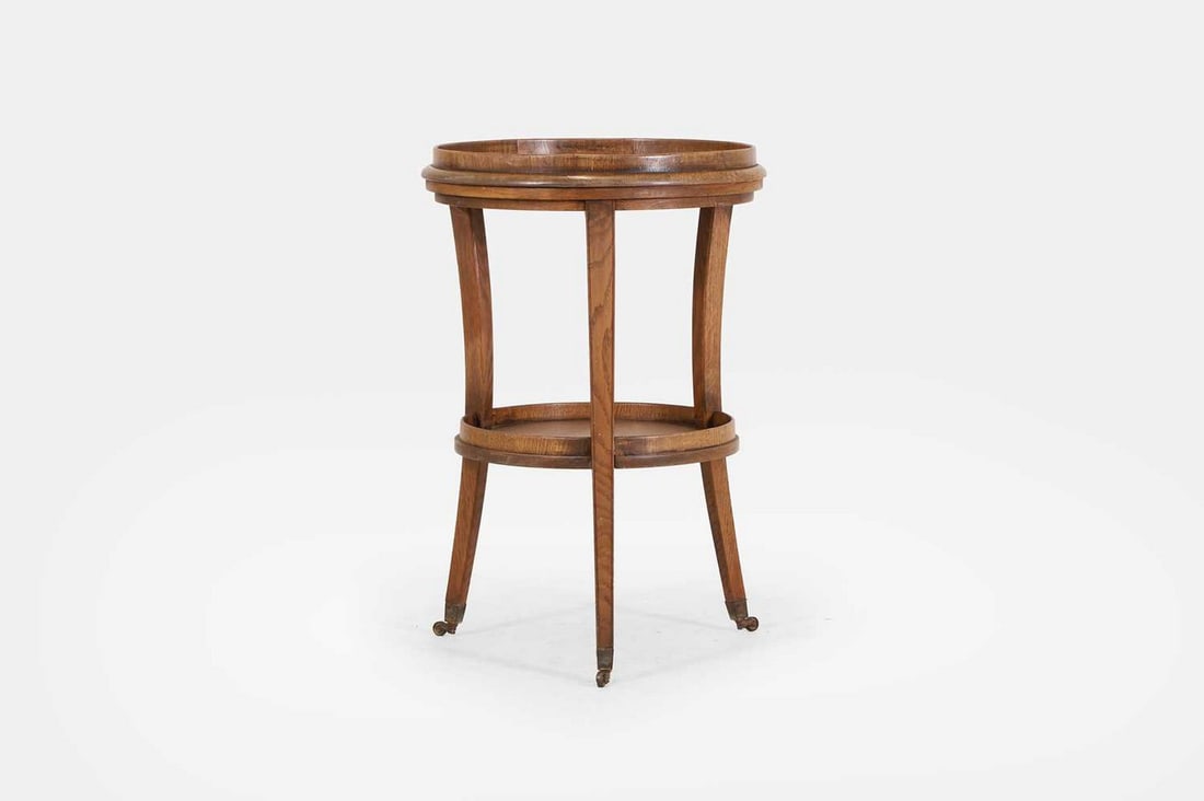 A brown oak 'Naval' occasional table by Robert Kime, of recent manufacture, (1 of 4)