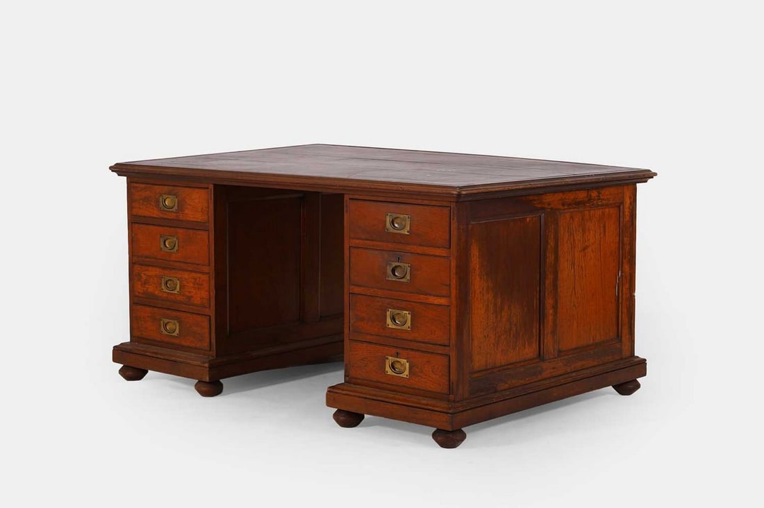 A Victorian teak campaign-style partners' desk, second half of the 19th century, (1 of 6)