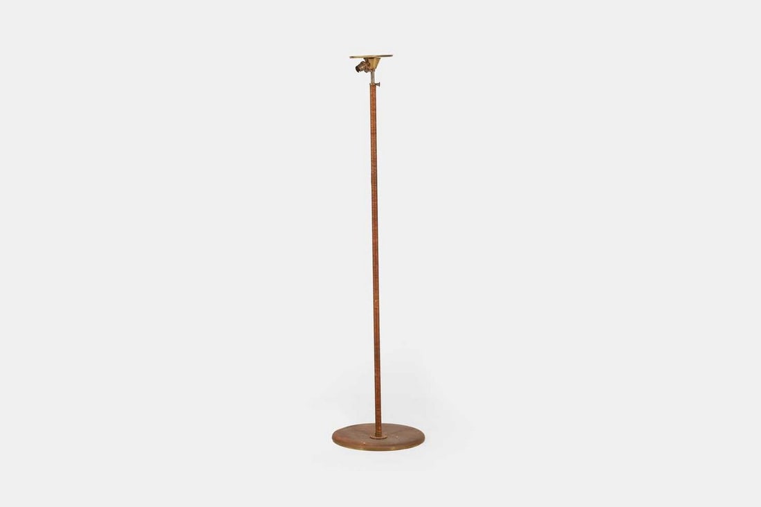 A rattan and brass floor lamp, 20th century, (1 of 5)