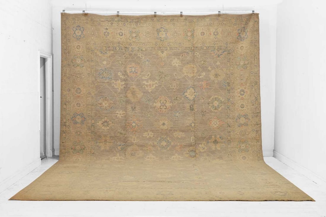 An Oushak wool carpet, of recent manufacture, (1 of 6)