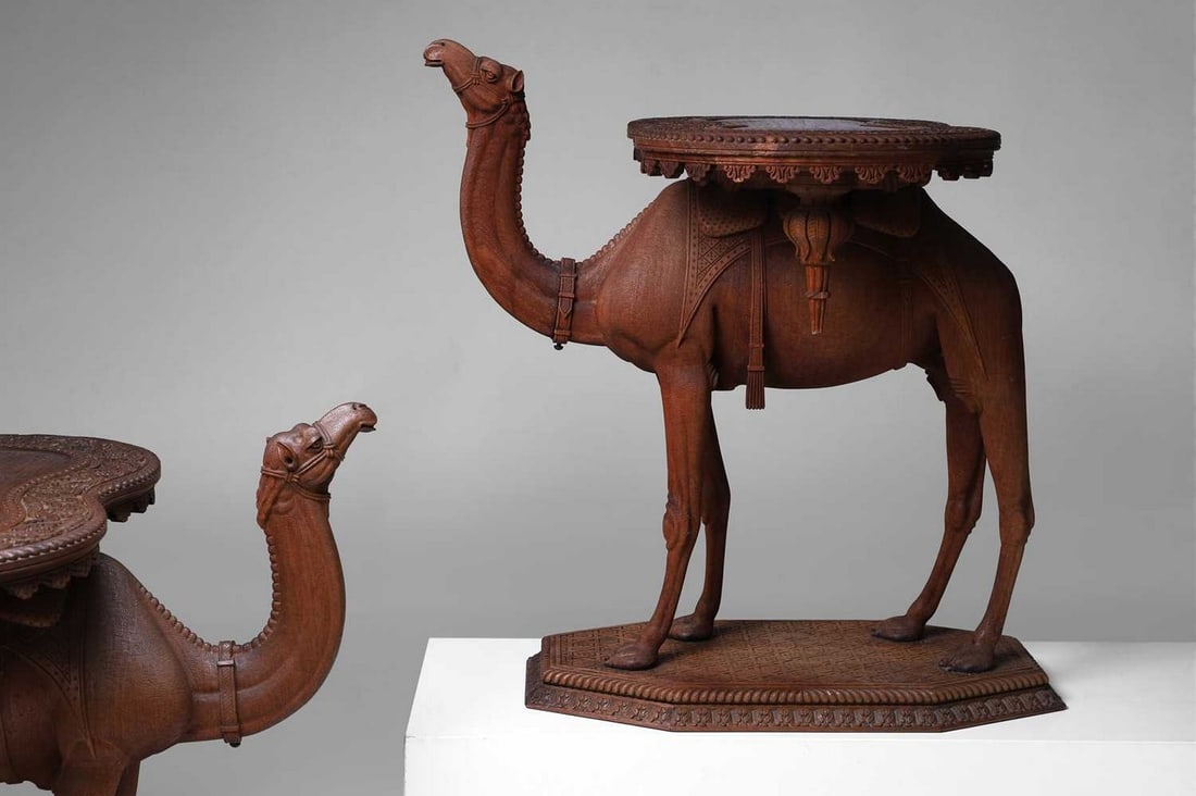 A pair of teak camel occasional tables, late 19th/early 20th century, Anglo-Indian, (1 of 9)
