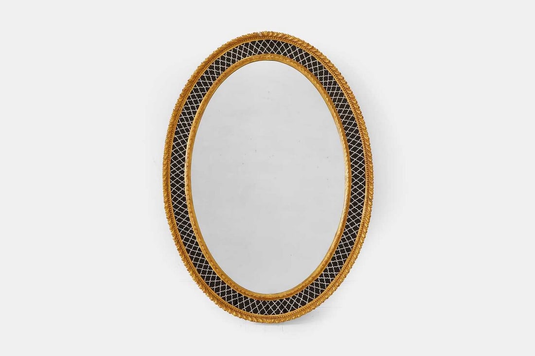 A George III carved giltwood and verre églomisé mirror, c.1780, (1 of 4)