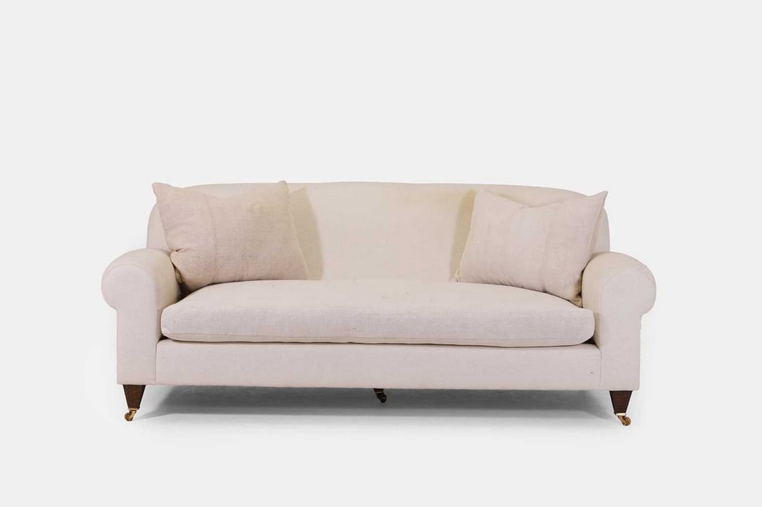 An upholstered two-seater sofa, of recent manufacture, (1 of 5)