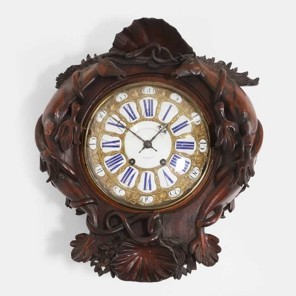 A carved walnut wall clock, 19th century, (1 of 5)