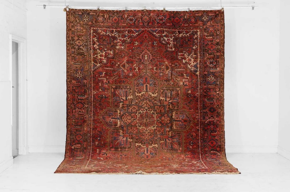 A Heriz rug, 20th century, (1 of 4)