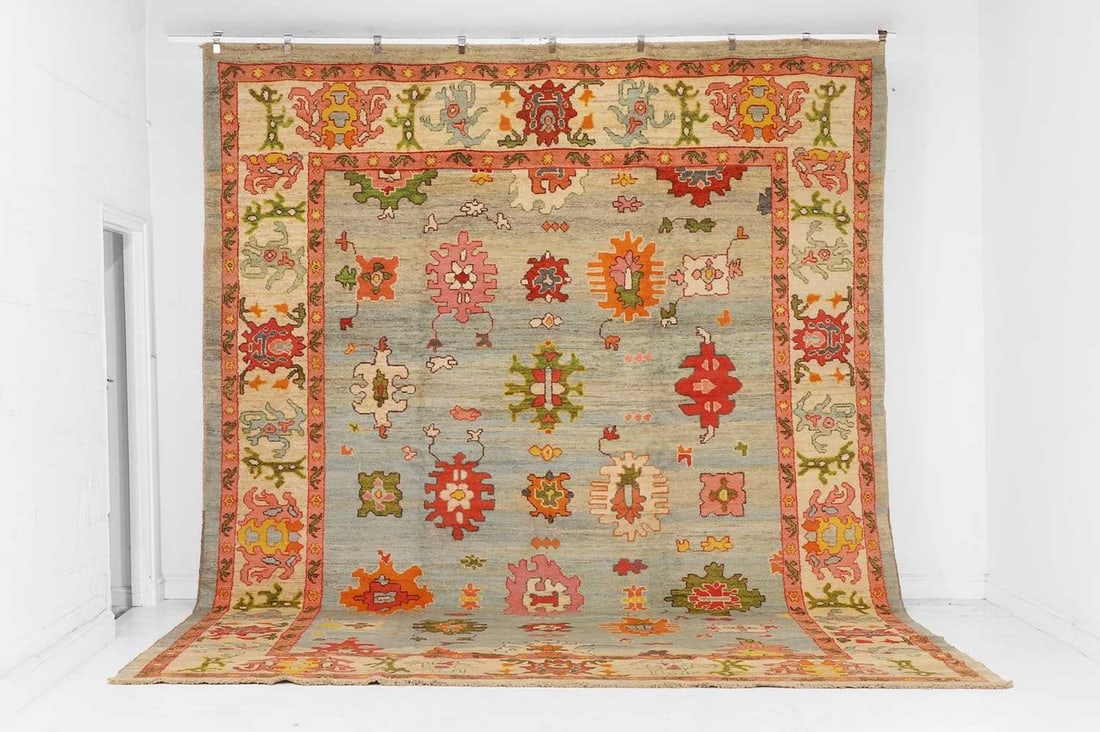 An Oushak wool carpet, of recent manufacture, (1 of 8)