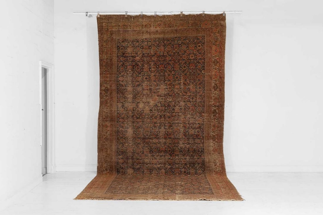 A Persian Feraghan wool kelleh carpet, c.1880, (1 of 6)