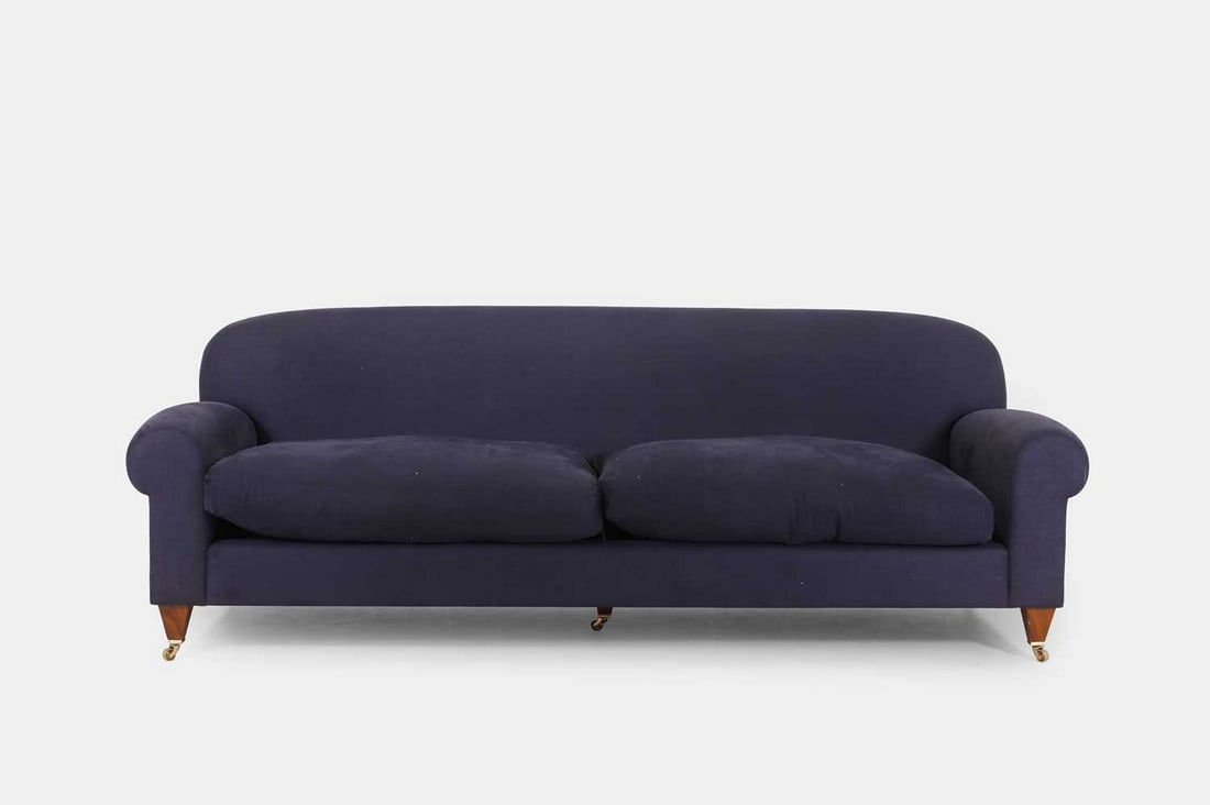An upholstered three-seater sofa, of recent manufacture, (1 of 3)