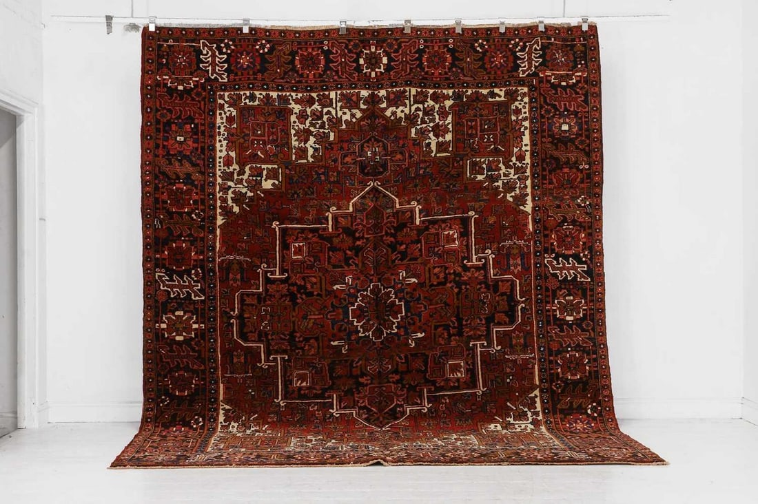 A Heriz wool carpet, 20th century, Persian, (1 of 4)