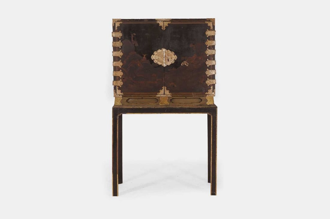 An export black and gilt lacquer cabinet-on-stand, Edo period, late 17th/early 18th century, (1 of 7)