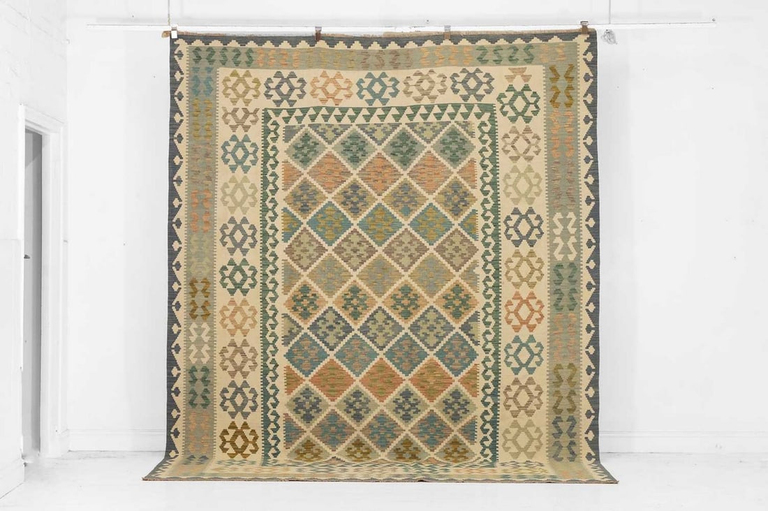 A kilim flat-weave wool carpet of Anatolian design, of recent manufacture, (1 of 4)