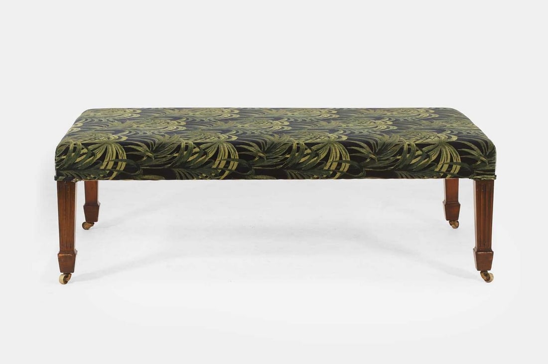 An upholstered stool or bench, of recent manufacture but incorporating some earlier elements, (1 of 4)