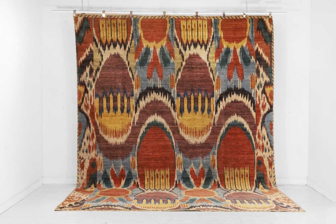 A wool carpet of Ikat design, of recent manufacture, (1 of 8)