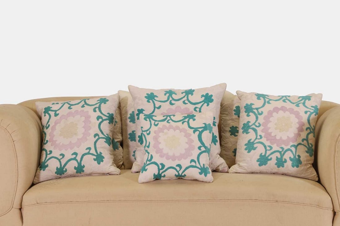 Seven suzani cushions, of recent manufacture, (1 of 4)