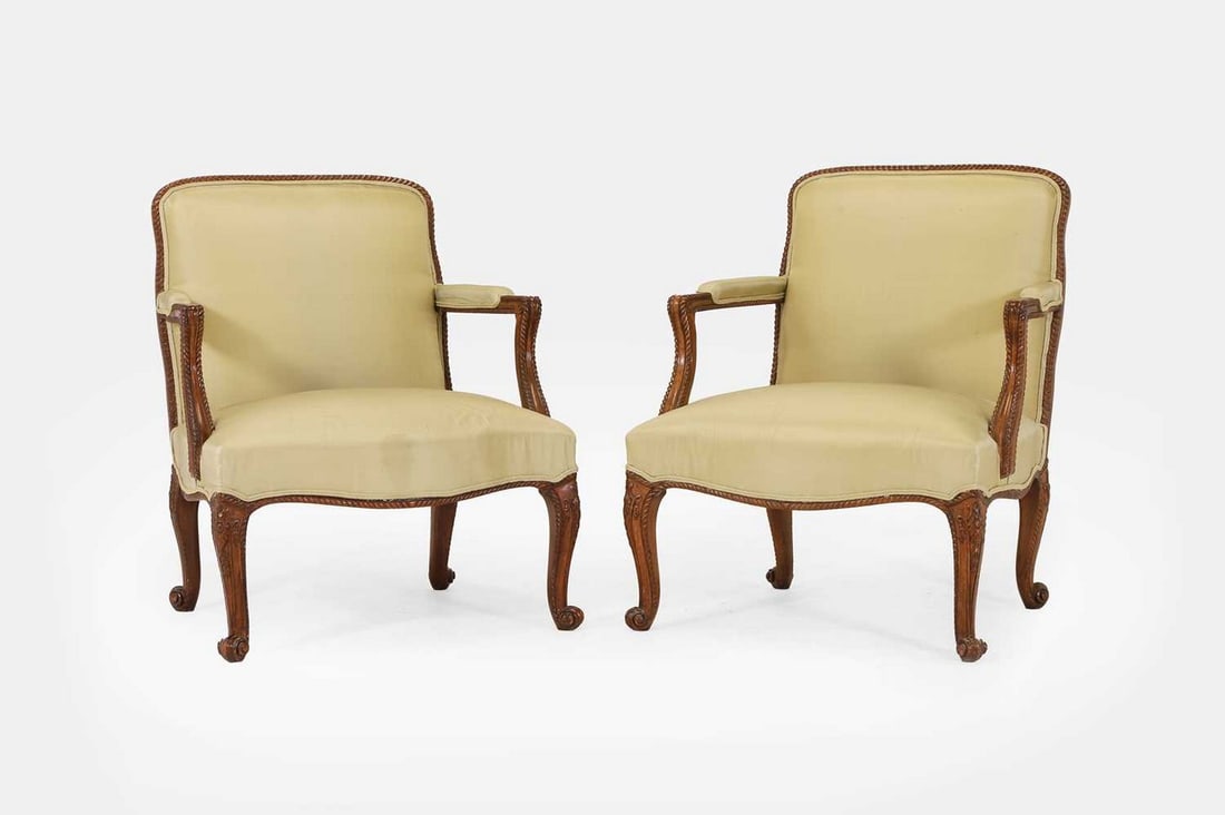 A pair of carved mahogany open armchairs in the George III style, 20th century, (1 of 4)