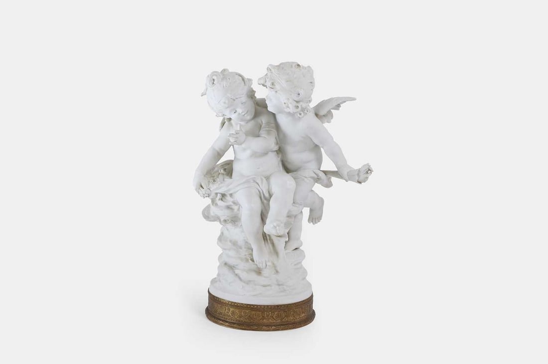 After Auguste Moreau, a biscuit porcelain figure group, (1 of 4)