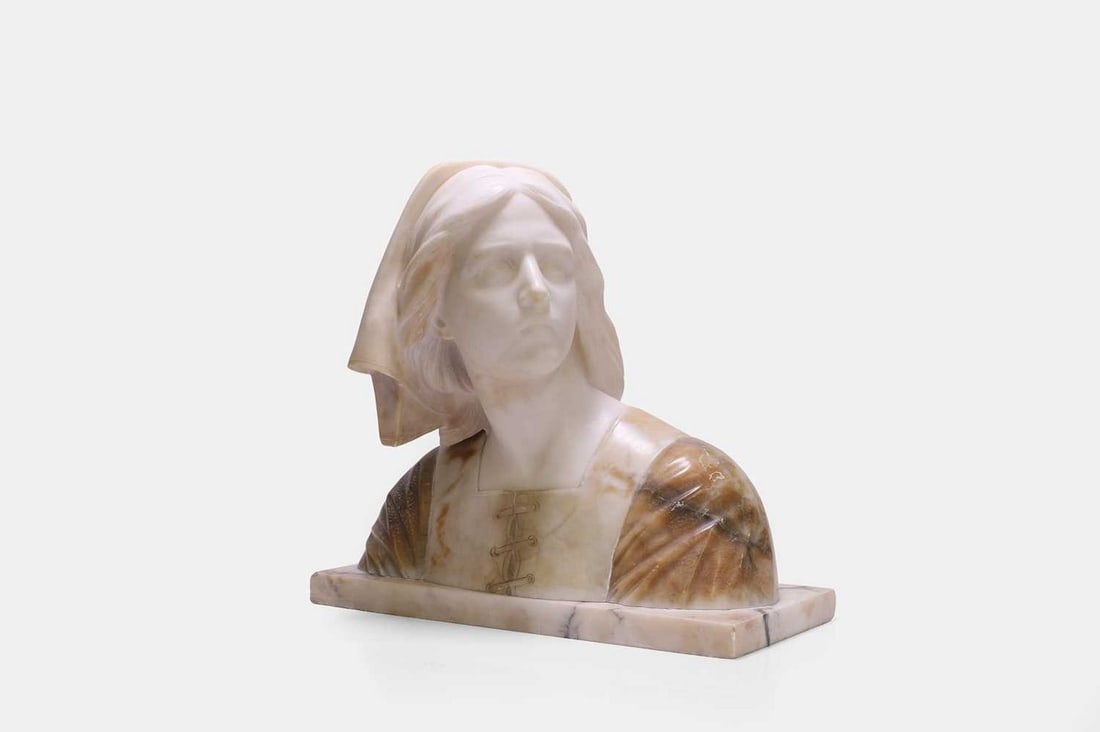 Professor Giuseppe Bessi (Italian, 1857-1922) an alabaster bust of Joan of Arc, (1 of 3)