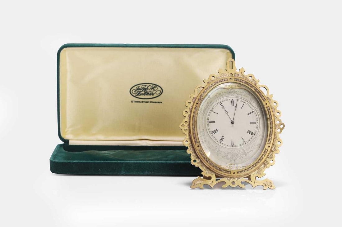 A gilt-brass strut timepiece in the manner of Thomas Cole, c.1870, (1 of 3)