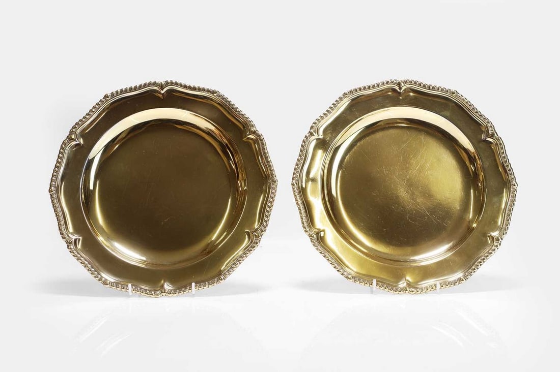 A pair of George II silver-gilt plates, maker's initial 'H', London 1754, (1 of 3)