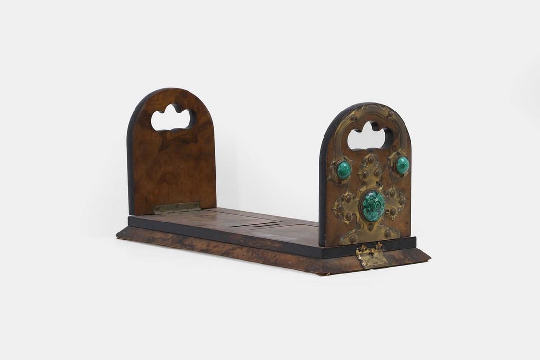 A Victorian Betjemann's patent walnut book slide, fourth quarter of the 19th century,: A Victorian Betjemann's patent walnut book slide, fourth quarter of the 19th century, numbered '4358', with two hinged ends mounted with gilt-brass Gothic-style panels, inset with malachite cabochons