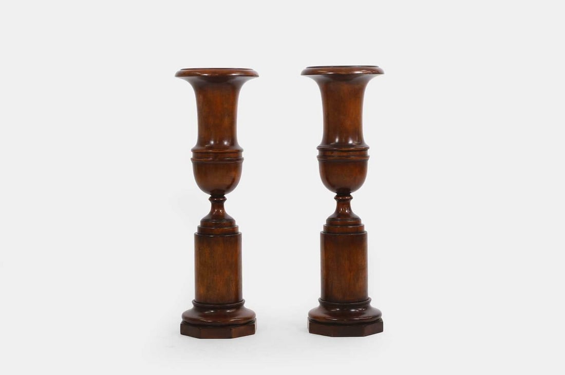 A pair of turned wooden urns, 20th century, (1 of 3)