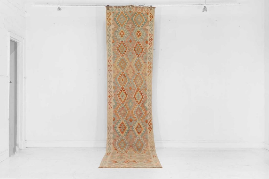 A flat-weave wool runner of Anatolian design, of recent manufacture, (1 of 3)