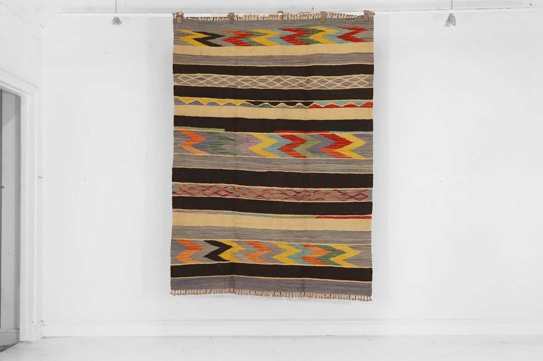 A flat-weave wool rug of Anatolian design, of recent manufacture, (1 of 3)