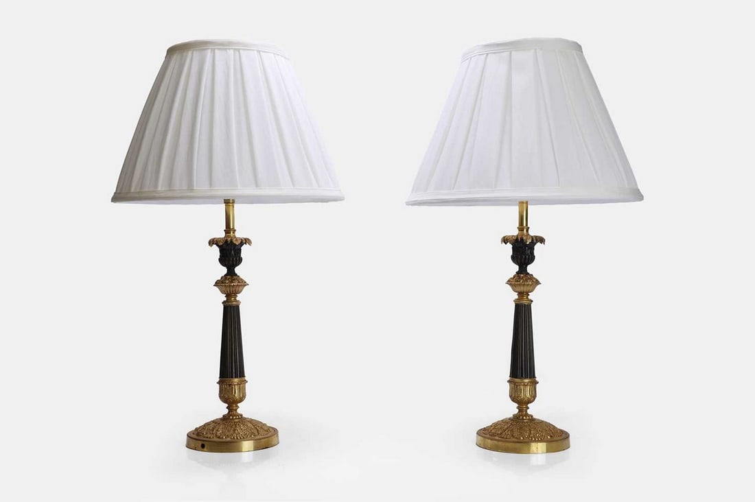A pair of patinated and gilt-bronze candlestick lamps, early to mid-19th century, French, (1 of 3)