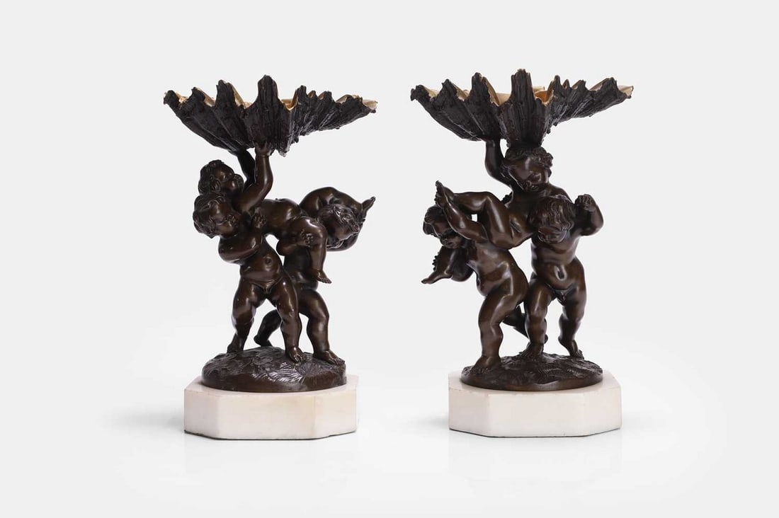 A pair of patinated bronze tazzas in the manner of Clodion, late 19th/early 20th century, French, (1 of 3)