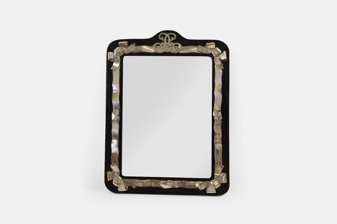 A large silver-mounted mirror, the silver by George Heath, London 1887, (1 of 3)