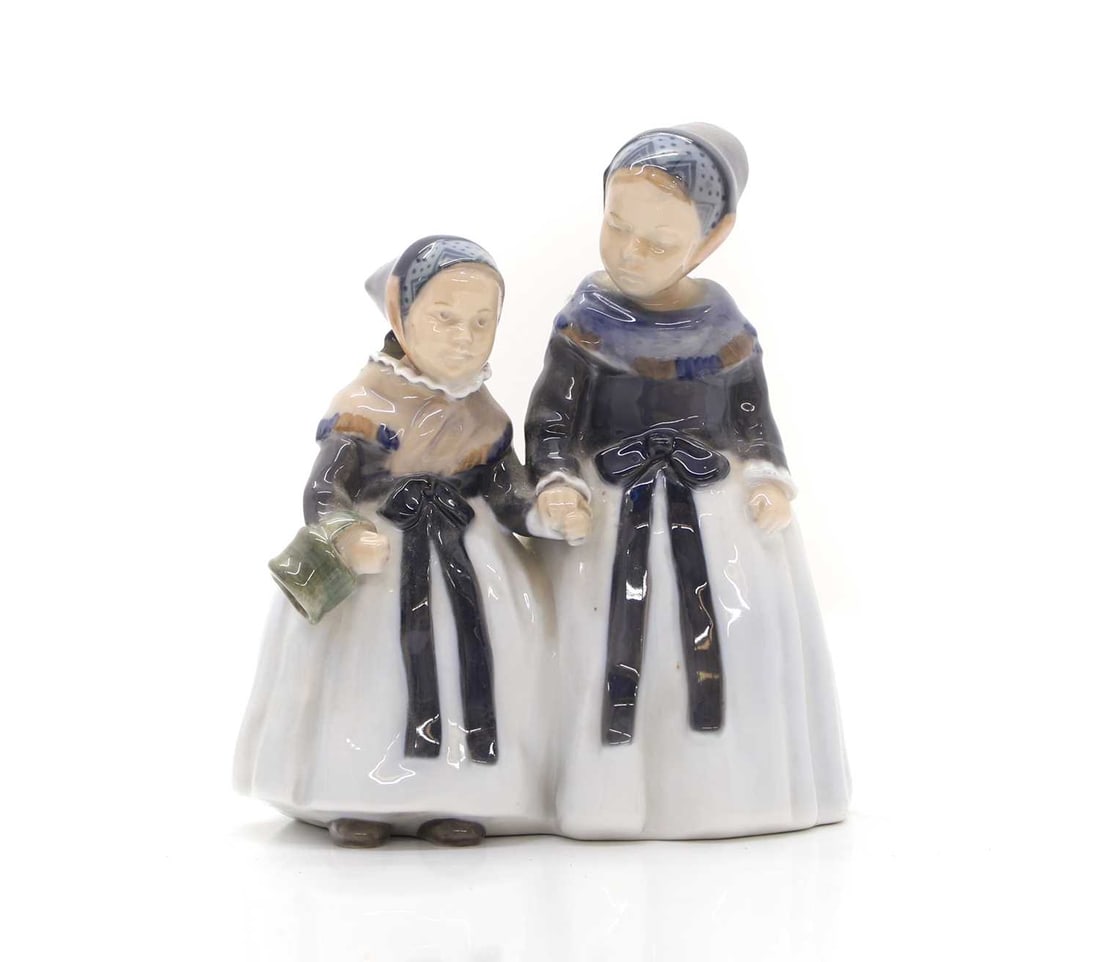 A Royal Copenhagen figure of two children,: A Royal Copenhagen figure of two children, 20th century, no.1316, painted and printed marks, 17cm wide 18cm high