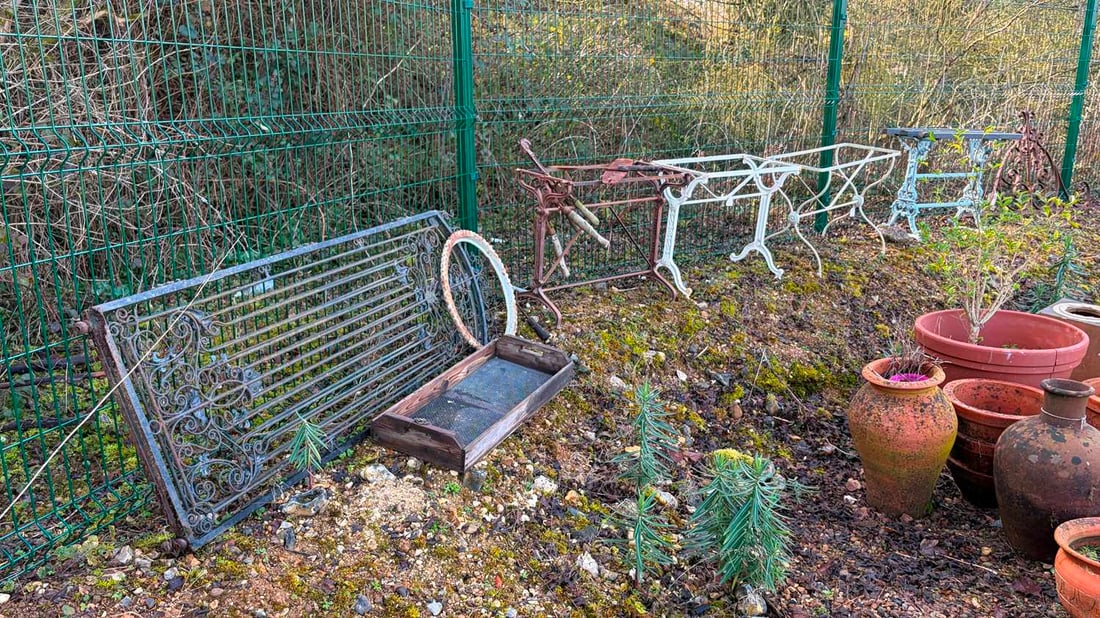 A collection of garden cast iron items, (1 of 4)