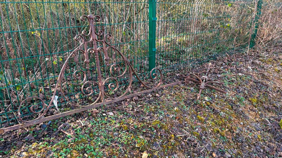 A collection of garden cast iron items, - 2