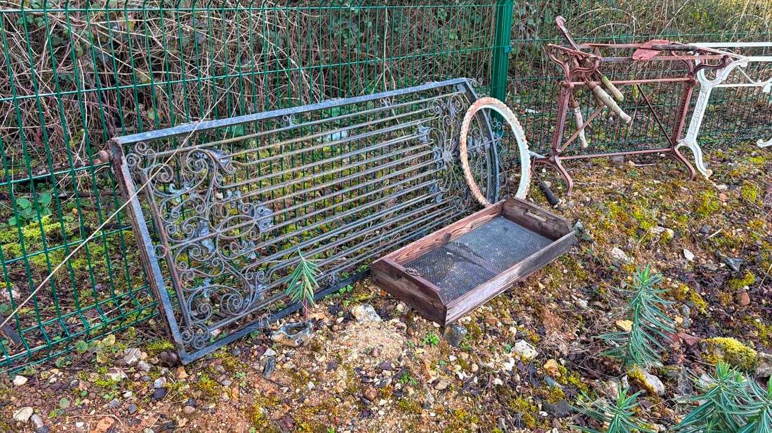 A collection of garden cast iron items, - 3