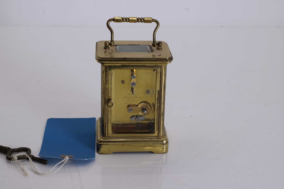 A modern brass carriage clock, by Matthew Norman, - 2