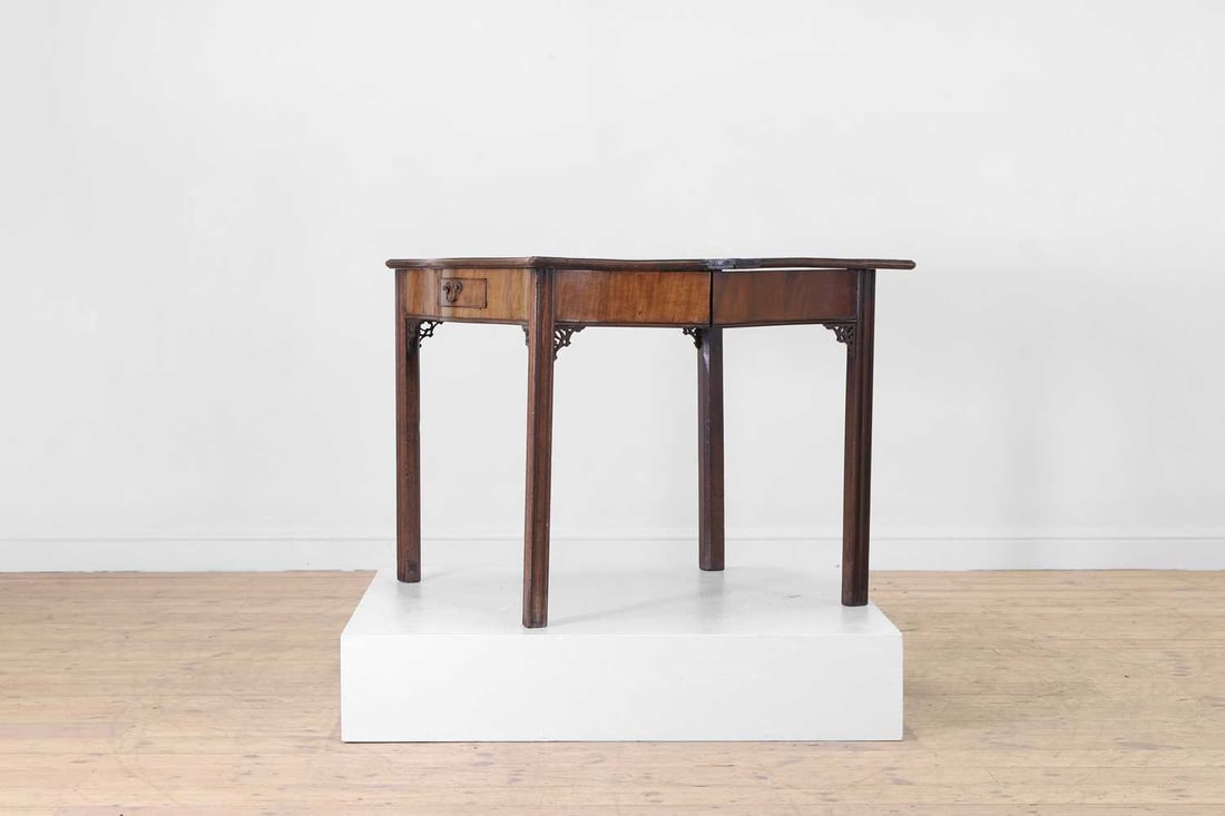 A George III mahogany serpentine tea table, circa 1760, - 6