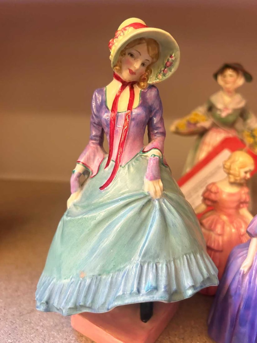 A collection of ten Royal Doulton figures, 20th century, - 12