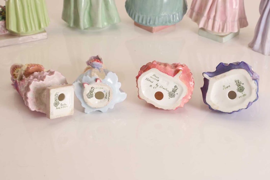 A collection of ten Royal Doulton figures, 20th century, - 7