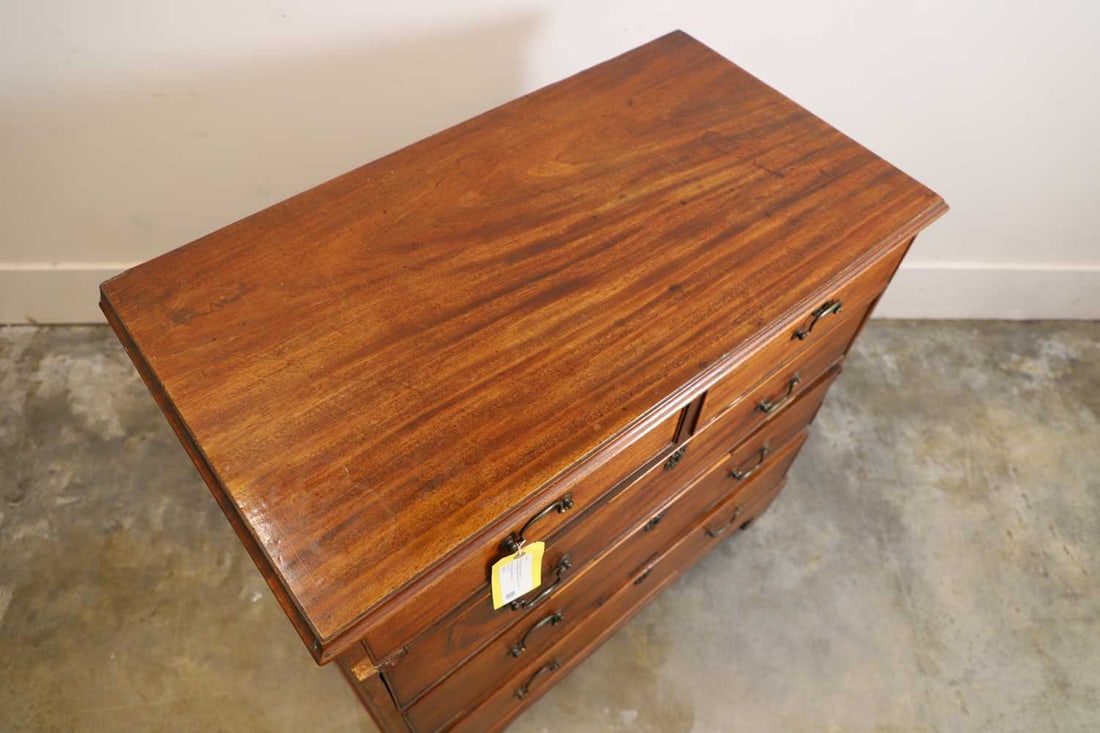 A George III mahogany chest of drawers, 19th century, - 2