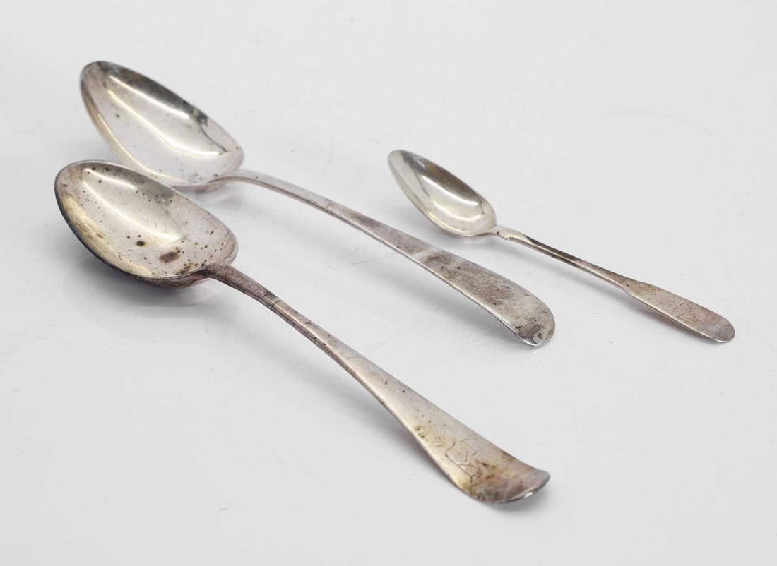 Four George II silver table spoons, (1 of 2)