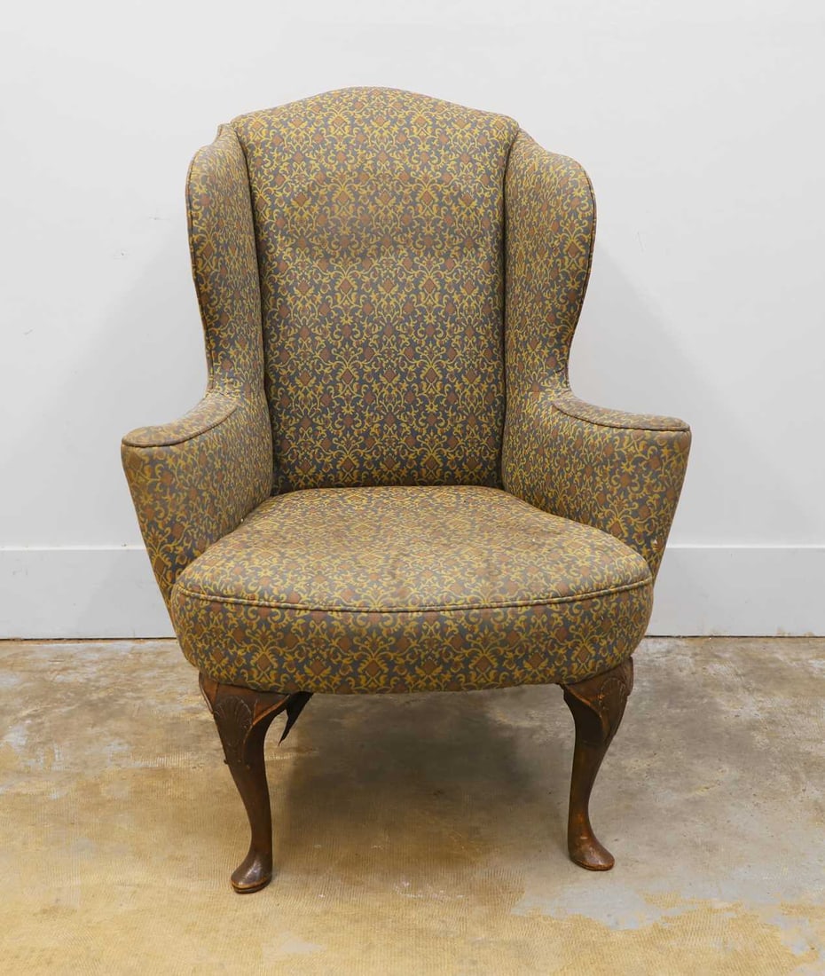 A George II style wingback armchair, - 2