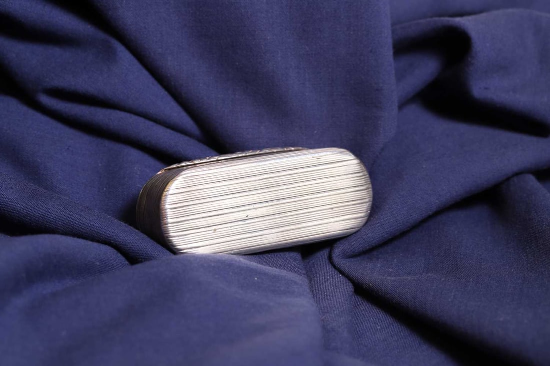 A collection of three snuff boxes, - 12