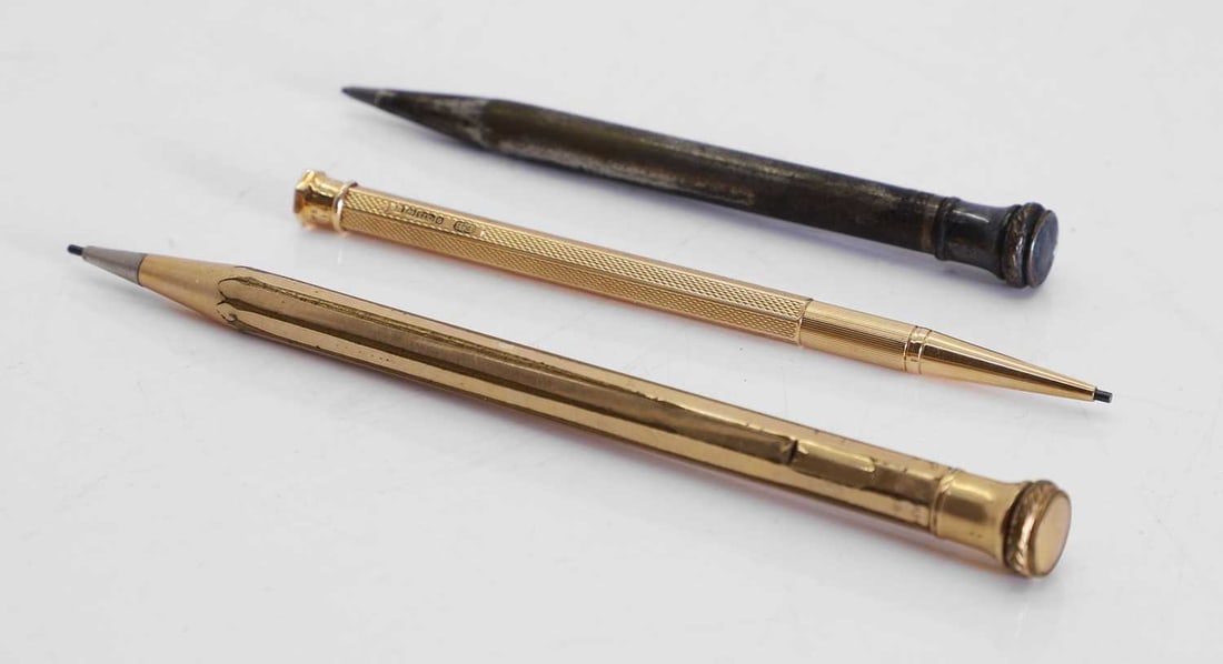 A Mordan Everpoint 9ct gold propelling pencil, by EB, Birmingham, 1936,: A Mordan Everpoint 9ct gold propelling pencil, by EB, Birmingham, 1936, cased, and two further gold and silver plated pencils 10.7cm long, 9ct gold total 15.3g 3 Condition Report: Gold -