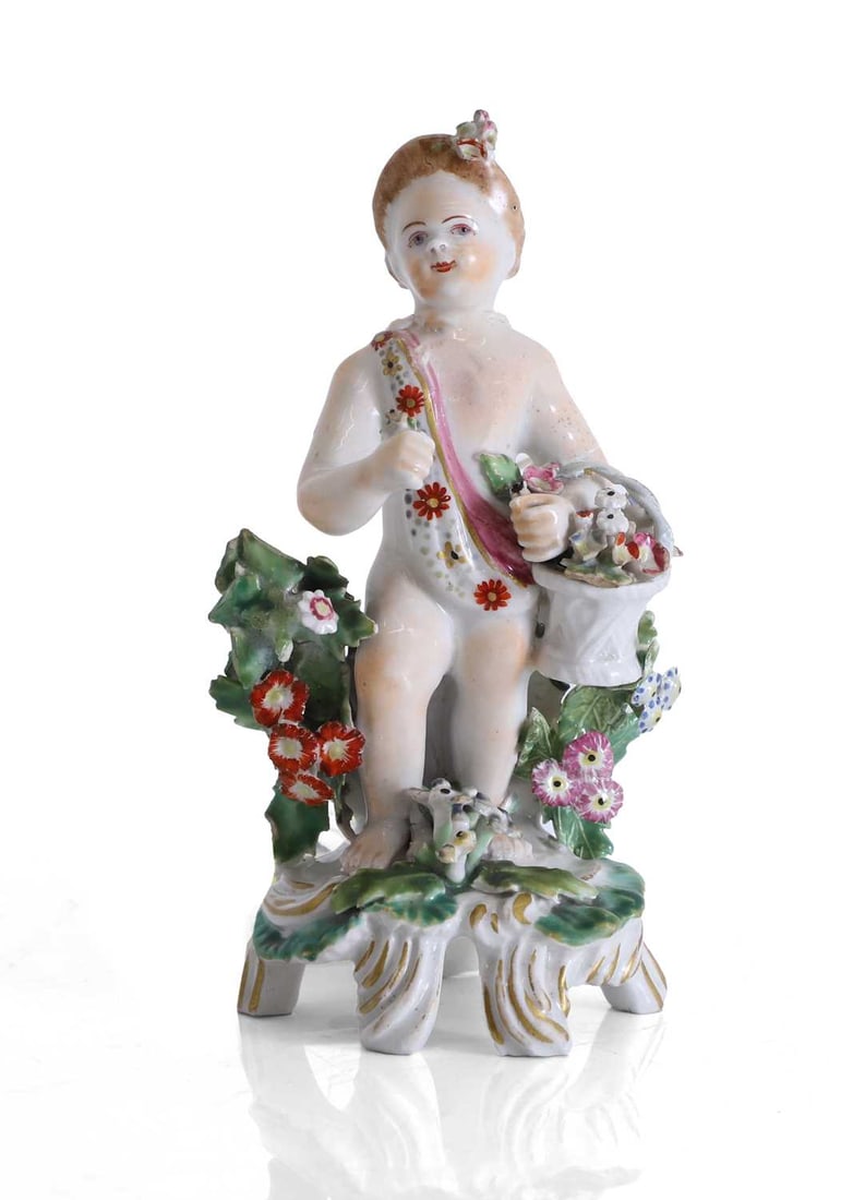A Continental porcelain figure of a flower-gathering putto, 19th century, (1 of 1)