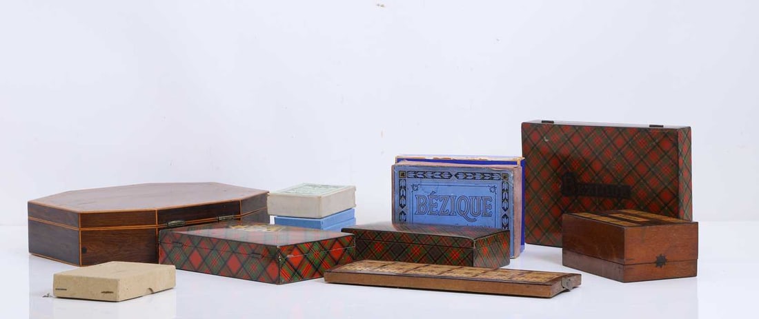 A collection of games and game boxes, 19th century and later,: A collection of games and game boxes, 19th century and later, to include a Willis & Co, London, Bezique set, c.1875, comprising a deck of playing cards without indices, with square corners, and