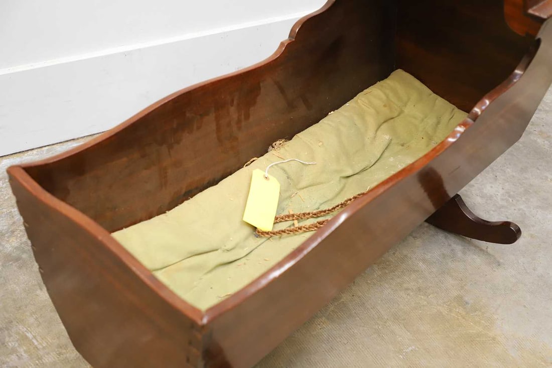 A mahogany crib, 19th century, - 2