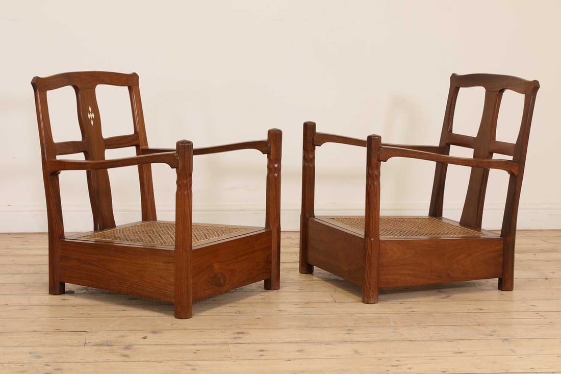 A near pair of Indian rosewood lounge chairs, early 20th century, Bombay School of Arts & Crafts, - 7