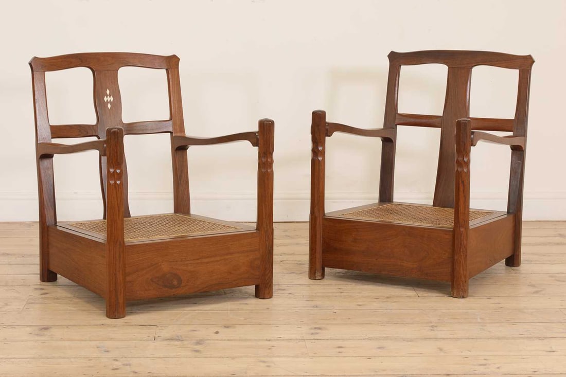 A near pair of Indian rosewood lounge chairs, early 20th century, Bombay School of Arts & Crafts, - 8